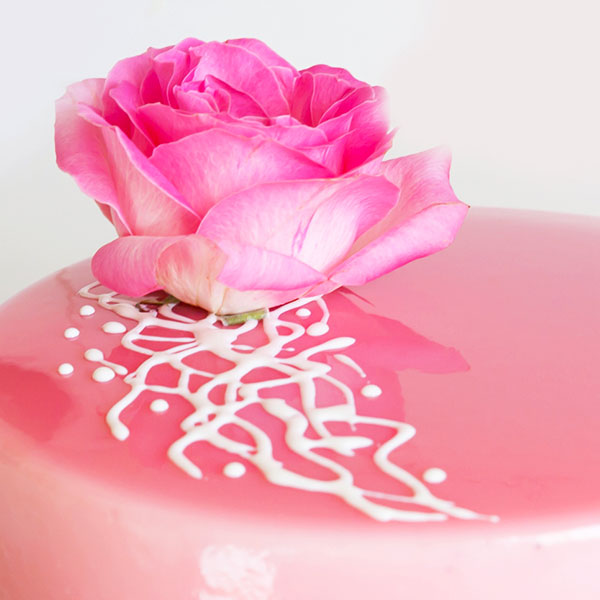 French mousse cake with pink mirror glaze